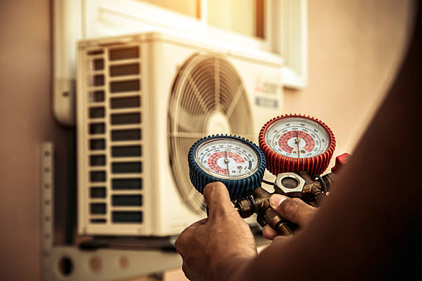 Professional Heat Pump Repair technician working in Auburn, MA